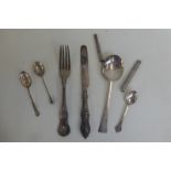 An Arts & Crafts style silver serving spoon, Sheffield 1930, by Thomas Bradbury & Sons, a Georgian