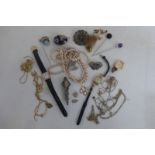 A collection of assorted jewellery including a gold heart shaped pendant, earrings including a
