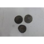 Three hammered pennies.