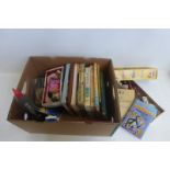 A box of assorted childrens books and toys including a boxed Pelham puppet.