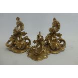 Three miniature giltwood Florentine wall brackets of ornate form.