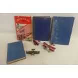 Three die-cast model aeroplanes including an Aviva Toy Co. bi-plane made in Hong Kong; also four
