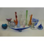 A collection of coloured glassware including vases, a decanter etc.