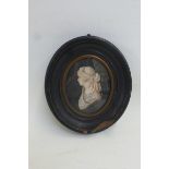 LATE 18TH CENTURY - a small oval Grisaille miniature, sized and dated 1794.