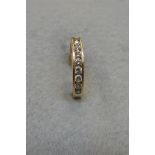 A 14k gold half eternity ring set with a row of diamonds, by repute approx 1/2ct in total.