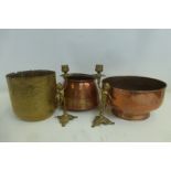 A large polished copper pedestal bowl, a hammered copper jardiniere, an Eastern brass jardiniere and