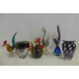 A selection of assorted coloured glassware including four cockerels.