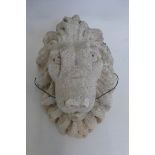 A well carved stone lion's head, probably 19th Century.