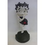 A decorative doorstop in the form of Betty Boop.