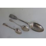 Two Georgian silver teaspoons, London 1817 and 1826 and a Victorian silver serving spoon, makers