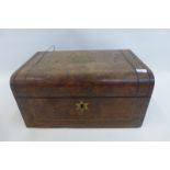 A 19th Century walnut vanity box with fitted interior.