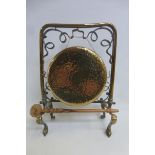 An Art Nouveau brass dinner gong.