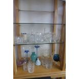 A collection of glassware to include flared vases, tumblers etc.