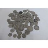 Approximately 47 silver coins.