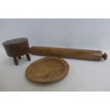 An 18th Century turned treen sycamore food platter, together with a sycamore rolling pin and a