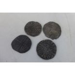 Four hammered pennies.