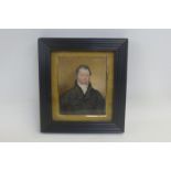 19TH CENTURY ENGLISH SCHOOL - a portrait miniature set within a classic ribbed frame and a golden