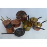 A collection of 19th Century and later copper and brassware including saucepans etc.