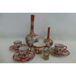 A selection of Kutani Japanese porcelain including a bulbous vase with slender neck.