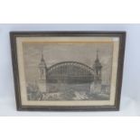 A framed and glazed black and white railway print depicting a Victorian train station, titled