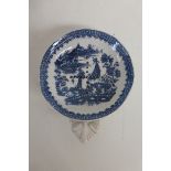 A late 18th/early 19th Century pearlware blue and white strainer, possibly Bristol or Liverpool.