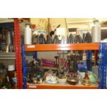 Two shelves worth of assorted ironmongery and kitchenalia etc.