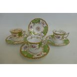 Three good quality Coalport cups and saucers plus an extra saucer, retailed by T. Goode & Co.