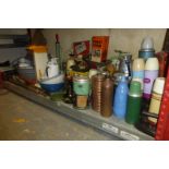 An extensive collection of kitchenalia including enamel ware, scale weights etc.