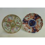 A 19th Century Canton plate and a 19th Century Japanese Imari dish.