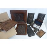 A box of 19th Century and later carved panels together with a small rosewood box containing a