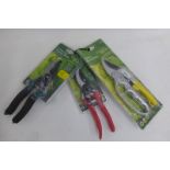 Three pairs of secateurs.