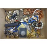 A box of assorted jewellery including a necklace, possibly lapiz lazuli and pearl beads, also a