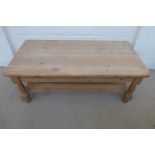 A pine rectangular coffee table with undertier.