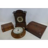 An Edwardian oak cased mantle clock, an F.J. Ross & Sons of Winchester oak cased circular barometer,