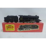 A boxed Hornby-Dublo LMR locomotive and tender.