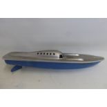 A Victory Industries tinplate model of a speedboat titled Miss England.