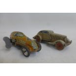 A Marx Toys clockwork tinplate single seater racing car and one other.