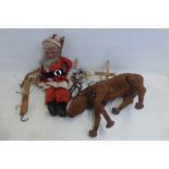 Two rare and early puppets in the form of Father Christmas and a reindeer.