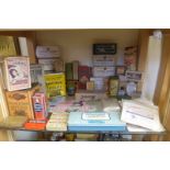 A collection of packaging and products relating to chemists and remedies.