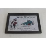 A small Wild Woodbine Cigarettes pictorial advertising mirror, 13 1/2 x 9 1/2".