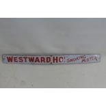 A 'Westward Ho!' Smoking Mixtur rectangular enamel strip, in very good condition, 24 x 2".