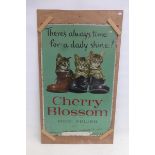 A Cherry Blossom Shoe Polish pictorial tin advertising sign depicting three kittens sat in boots,