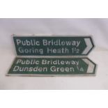 A pair of 'Public Bridleway' directional aluminium signs for 'Dunsden Green' and 'Goving Heath',