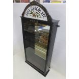A rare Fry's Chocolate front opening, wall mounted pediment cabinet with milk glass insert, 21 1/