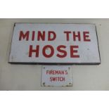 A rectangular fold out enamel garage forecourt stand - 'Mind the Hose', and a small enamel