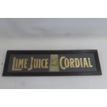 A Lime Juice Cordial glass sign in original frame, 21 1/4 x 6".