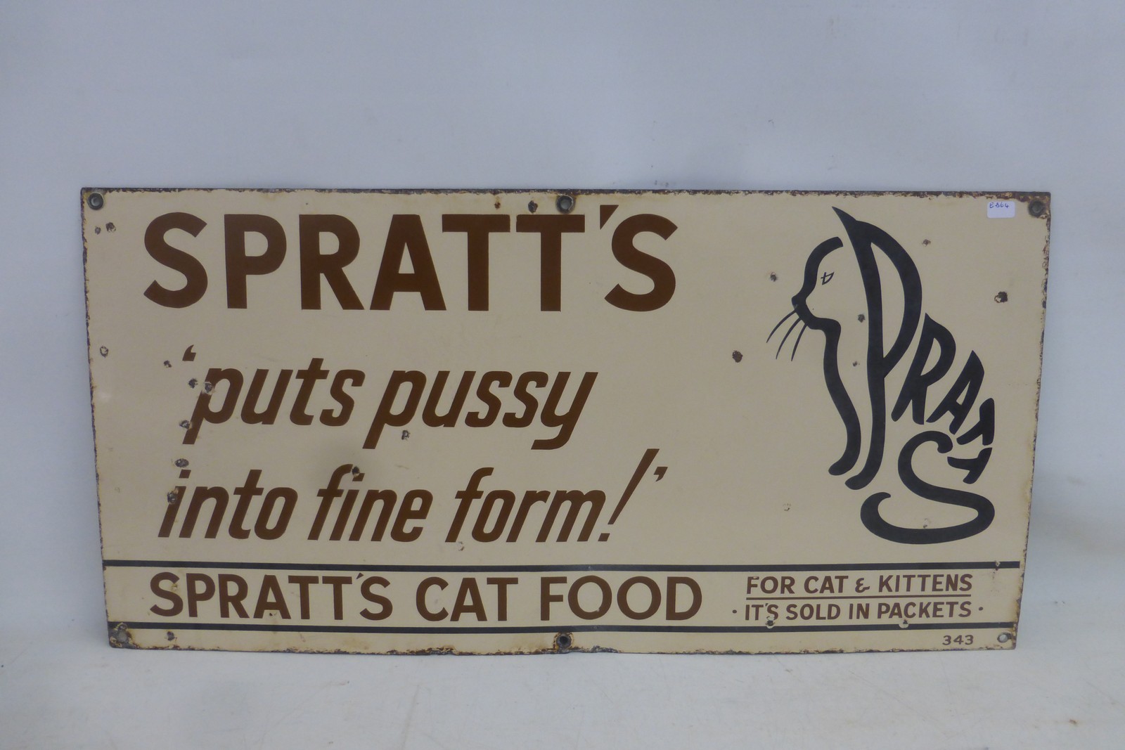 A Spratt's 'Puts Pussy into Fine Form!' part pictorial rectangular enamel sign, 24 x 12 1/4".