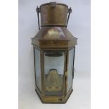 An early brass oil lamp circa 1914.