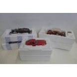 Three boxed Franklin Mint die-cast models.