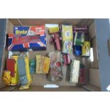 A box of mixed playworn die-cast toys including Dinky and Lesney.